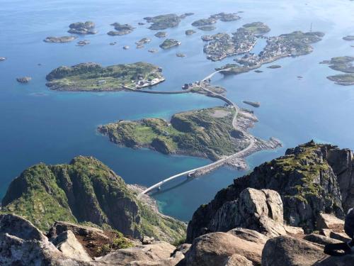 an aerial view of the islands in the water at Henningsvær Guesthouse in Henningsvær