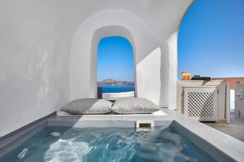 The swimming pool at or close to Amaya Sensational Villa Caldera View-Outdoor Hot Tub Oia Santorini