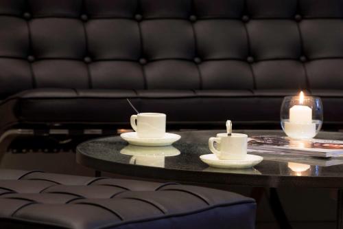 Χώρος καθιστικού στο Hotel Paris Italie