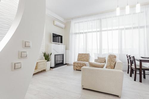 TV a/nebo společenská místnost v ubytování Arcadijskiy Palace