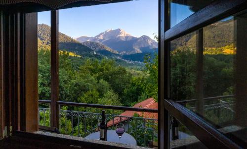 a view from a window of a mountain view at Studio Iviscos in Mikrón Khoríon