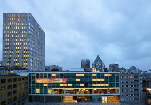 a view of a tall building in a city at citizenM Rotterdam in Rotterdam