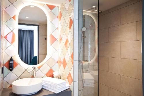 Vannituba majutusasutuses ibis Styles Klagenfurt am Woerthersee