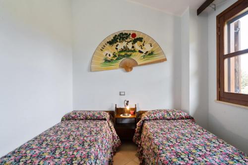 Postel nebo postele na pokoji v ubytování Villamara