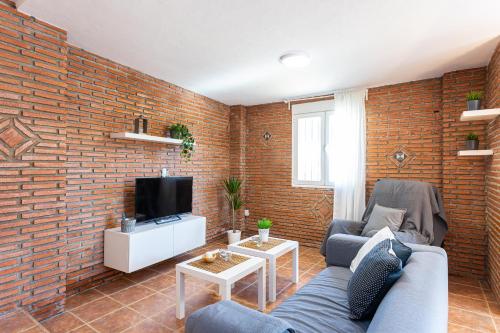 TV a/nebo společenská místnost v ubytování Apartamento Alberti