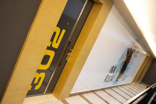 a door to a store with a bike on it at INN HOUSE LOFT SPA in Çankaya