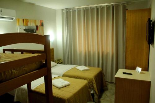 Una habitación en Hotel Pousada Valintur