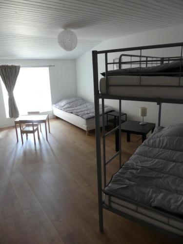 Postel nebo postele na pokoji v ubytování Grand gite du Puy Lambert