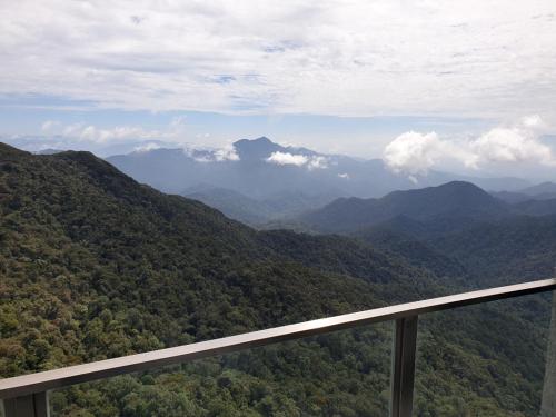a view of the mountains from a balcony of a mountain at Studio Suite Genting Highland 32 in Genting Highlands