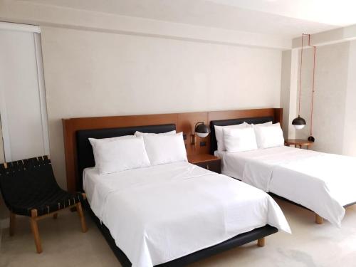 Postel nebo postele na pokoji v ubytování Mex Hoteles