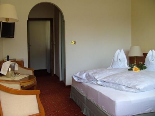 Postel nebo postele na pokoji v ubytování Hotel Annabell