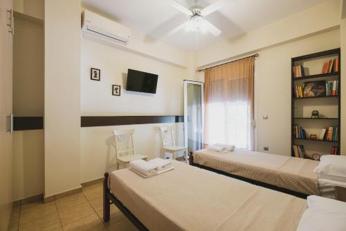 Posteľ alebo postele v izbe v ubytovaní Modern Maisonette