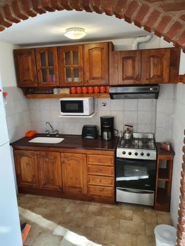 Cuina o zona de cuina de Complejo Villa Calitri