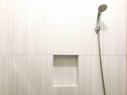 Koupelna v ubytování Sofia Residence Syariah Mitra RedDoorz