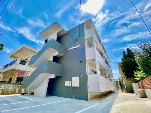 a building with stairs on the side of it at M-Villaggio Miyakojima in Miyako-jima