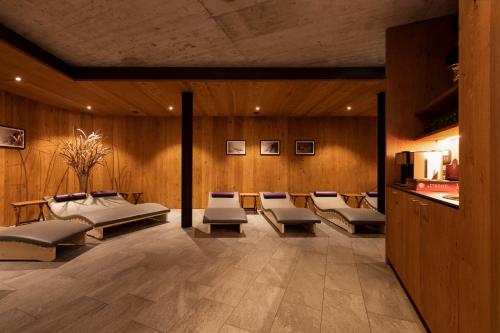 a room with a bunch of beds in it at Apart6580 in Sankt Anton am Arlberg