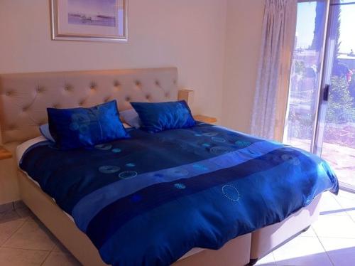 Кровать или кровати в номере Panaview Bed & Breakfast