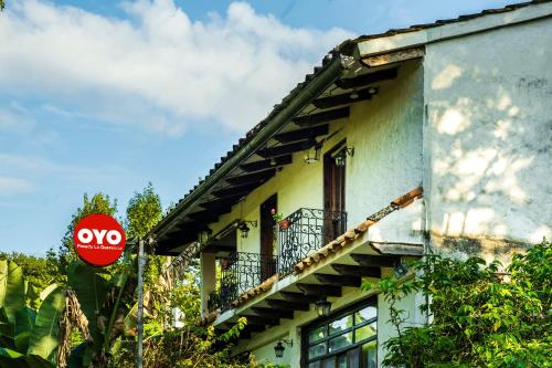 a stop sign in front of a building at Posada La Querencia in Xico