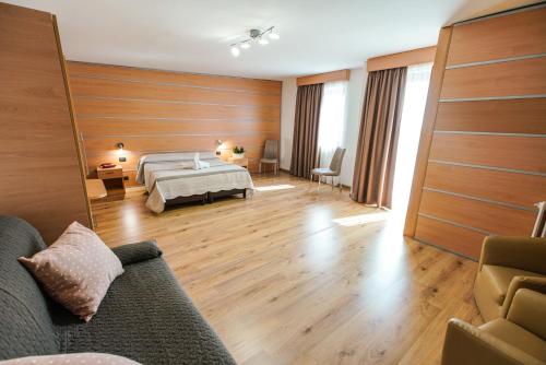 Postel nebo postele na pokoji v ubytování Hotel Murgia