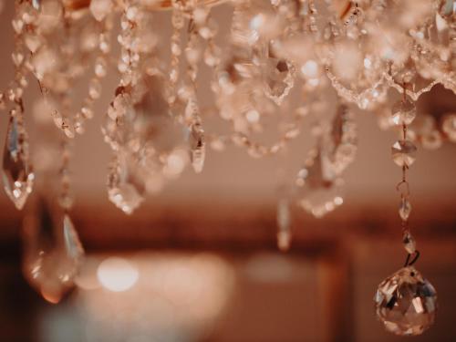 a close up of a chandelier with crystals at Genesta House in Cowes
