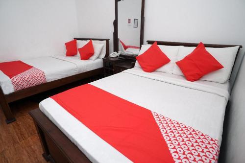 Katil atau katil-katil dalam bilik di Shirantha Hotel
