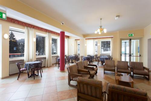 Reštaurácia alebo iné gastronomické zariadenie v ubytovaní Hotel Zodiaco & Spa