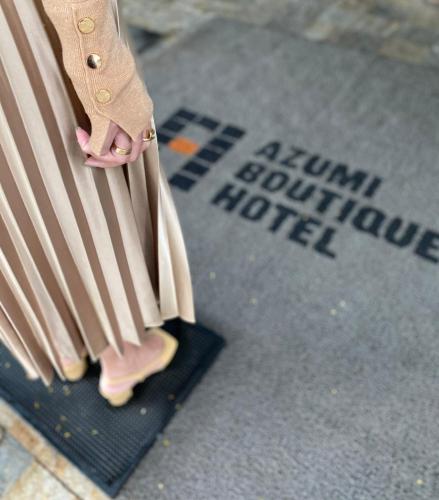 a person standing on a skateboard on a street at Azumi Boutique Hotel in Manila