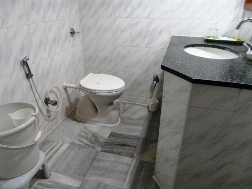 Koupelna v ubytování Hotel Sindhuri Park