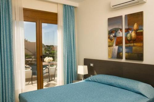A bed or beds in a room at Executive Rhodes Villa 4 Bedroom - 4 Bathroom Bd Villa Pefkos