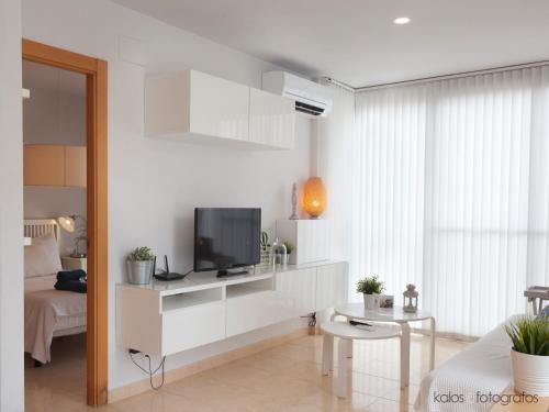 Televízia a/alebo spoločenská miestnosť v ubytovaní Encantador apartamento junto al Mediterraneo by Hometels