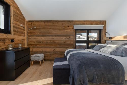 Giường trong phòng chung tại Paradise Awaits in the Mountains of La Tzoumaz