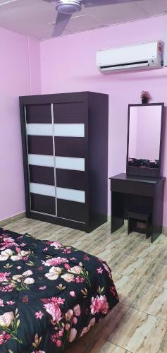 Postel nebo postele na pokoji v ubytování Serene Homes