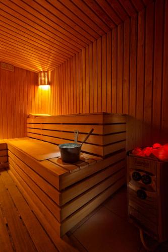 a sauna with a bowl on the inside of it at Korineum Golf & Beach Resort in Kérynia
