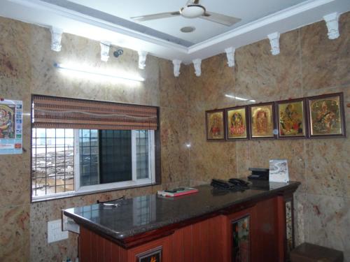 A kitchen or kitchenette at Hotel VIP Residency
