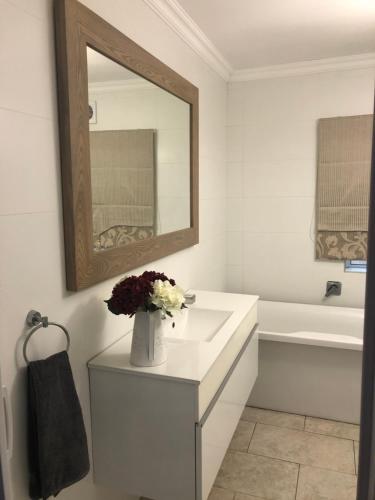 Vannituba majutusasutuses The Orchards Residence