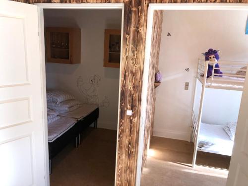 Letto o letti in una camera di Hestkær Family Rooms