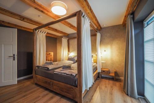 Postel nebo postele na pokoji v ubytování KajüteSiebenZwo