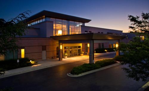 a large building with a lot of glass at Eaglewood Resort & Spa in Itasca