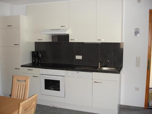 Kuchyň nebo kuchyňský kout v ubytování Haus Telisia