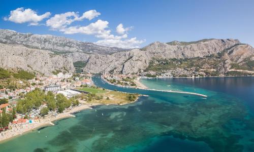 an aerial view of a beach and the water at House Dunja in Omiš