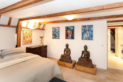 Postel nebo postele na pokoji v ubytování Bed & Breakfast of Art