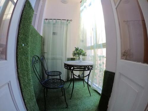 En balkong eller terrasse på Julius Caesar 183