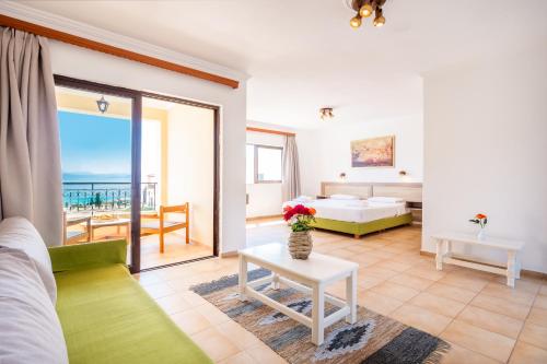 Postel nebo postele na pokoji v ubytování CORFU PELAGOS HOTEL