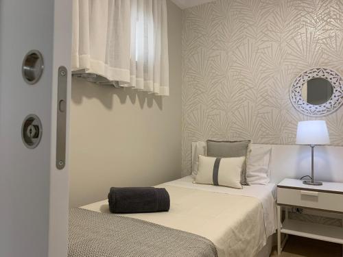 Ένα ή περισσότερα κρεβάτια σε δωμάτιο στο El apartamento de Concha