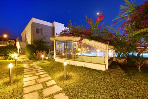 Κήπος έξω από το Royal Palm Residence