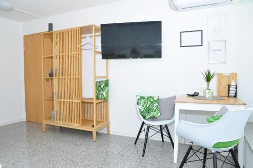 TV a/nebo společenská místnost v ubytování N37 -modern eingerichtete Zimmer in ruhiger Lage