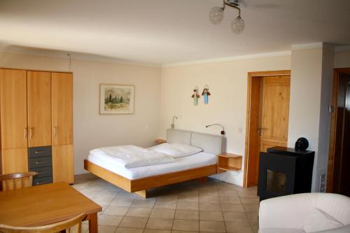 מיטה או מיטות בחדר ב-Ferienwohnung Fanese