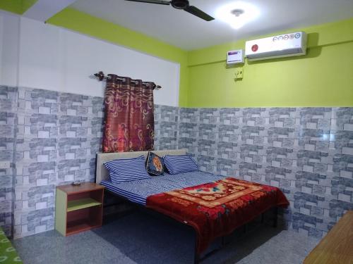 Postel nebo postele na pokoji v ubytování Baga F Leisure Stay Guest House