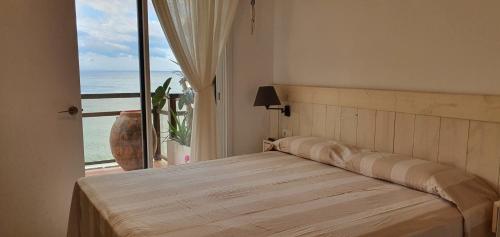 Postel nebo postele na pokoji v ubytování Apartamento en primera linea de mar - Sant Antoni de Calonge
