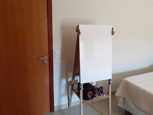Ένα ή περισσότερα κρεβάτια σε δωμάτιο στο Ibiza Inn Suítes Uberaba
